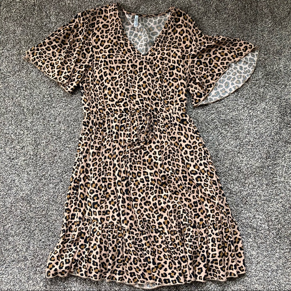 Faux wrap leopard dress